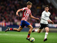 Marcos Llorente and Hugo Guillamon during La Liga match between Atletico de Madrid and Valencia CF at Civitas Metropolitano on March 18, 202...