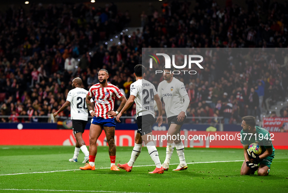 Memphis Depay and Giorgi Mamardashvili during La Liga match between Atletico de Madrid and Valencia CF at Civitas Metropolitano on March 18,...