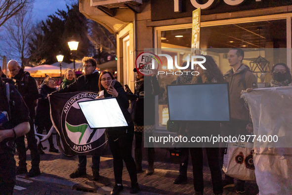 Activists at the entrance of a restaurant that serves foie gras, in Utrecht, Netherlands, on March 18, 2023.  