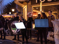 Activists at the entrance of a restaurant that serves foie gras, in Utrecht, Netherlands, on March 18, 2023.  (