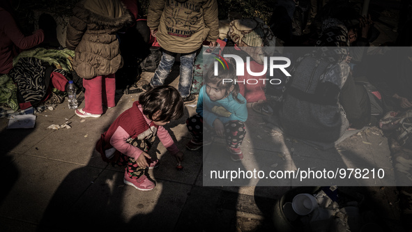 As the New Year approaches in to 2016, thousands of refugees continue to flood in to Greece, on December 30, 2015. When they reach Athens, m...