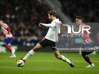 Nico Gonzalez central midfield of Valencia and Spain controls the ball during the La Liga Santander match between Atletico de Madrid and Val...