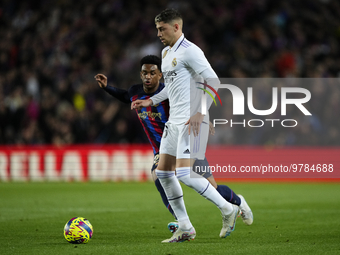 Federico Valverde central midfield of Real Madrid and Uruguay and Alejandro Balde left-back of Barcelona and Spain compete for the ball duri...