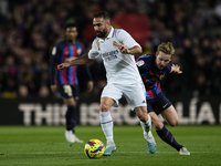 Daniel Carvajal right-back of Real Madrid and Spain and Frenkie de Jong central midfield of Barcelona and Netherlands compete for the ball d...
