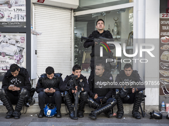 Police prepared to meet protesters on May Day in Istanbul on May 1, 2014. Turkish police used water canons and tear gas to disperse thousand...