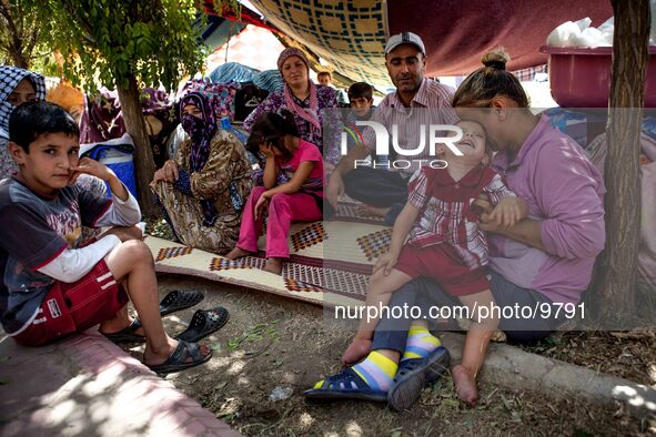 A family from the Quamshili area in syria living without any support and tents from the UNHCR at the Qushtepa Park near Erbil.
They told me...