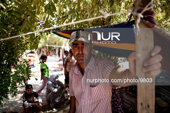 The father with his family and his disabled kid told me about the horrible escape from Syria.

Photo: Flo Smith/NurPhoto