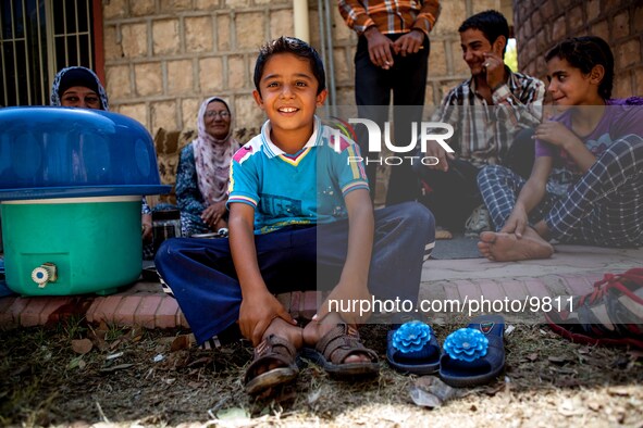 A family from the grandma to the youngest have to life outside without any shelters.

Photo: Flo Smith/NurPhoto