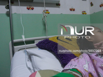 A young girl receive treatment from fever dengue at a hospital in Bogor, West Java, Indonesia on April 11, 2023. The World Health Organizati...