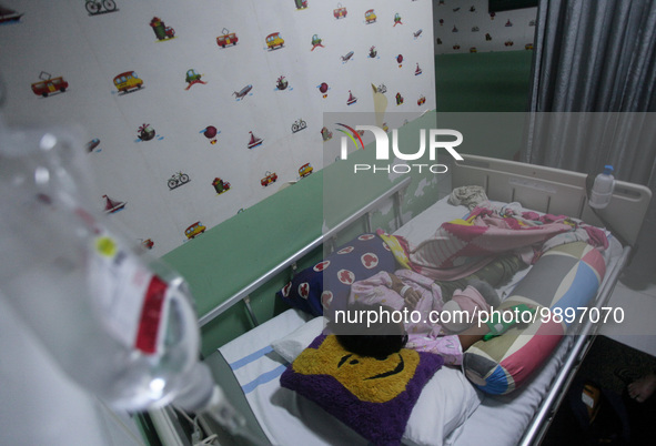 A young girl receive treatment from fever dengue at a hospital in Bogor, West Java, Indonesia on April 11, 2023. The World Health Organizati...