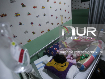 A young girl receive treatment from fever dengue at a hospital in Bogor, West Java, Indonesia on April 11, 2023. The World Health Organizati...