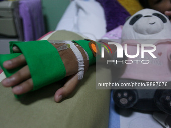 A young girl receive treatment from fever dengue at a hospital in Bogor, West Java, Indonesia on April 11, 2023. The World Health Organizati...