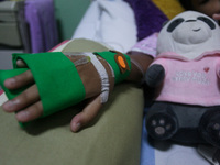 A young girl receive treatment from fever dengue at a hospital in Bogor, West Java, Indonesia on April 11, 2023. The World Health Organizati...