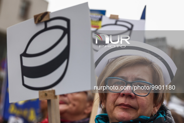 Polish nurses and midwives of hospitals from all the country take part in a protest marching through the streets of Krakow, Poland, on April...