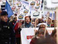 Polish nurses and midwives of hospitals from all the country take part in a protest marching through the streets of Krakow, Poland, on April...