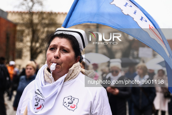 Polish nurses and midwives of hospitals from all the country take part in a protest marching through the streets of Krakow, Poland, on April...