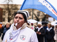 Polish nurses and midwives of hospitals from all the country take part in a protest marching through the streets of Krakow, Poland, on April...