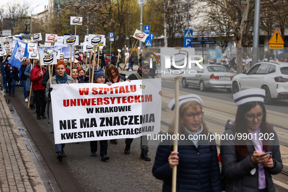 Polish nurses and midwives of hospitals from all the country take part in a protest marching through the streets of Krakow, Poland, on April...