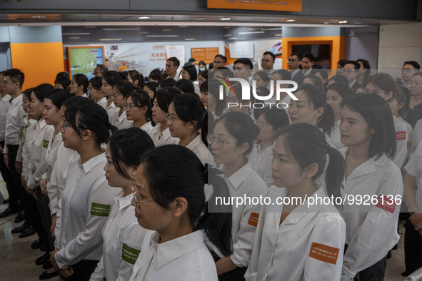 Healthcare Professionals participating in the Exchange Programme posing for a group photo inside the West Kowloon High Speed Railway station...