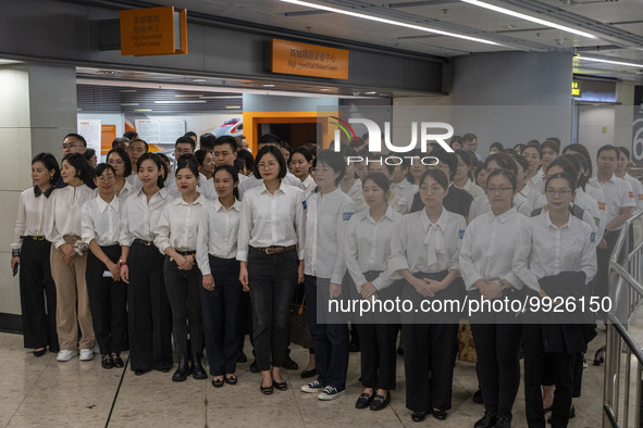 Healthcare Professionals participating in the Exchange Programme posing for a group photo inside the West Kowloon High Speed Railway station...