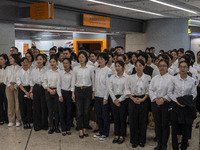 Healthcare Professionals participating in the Exchange Programme posing for a group photo inside the West Kowloon High Speed Railway station...