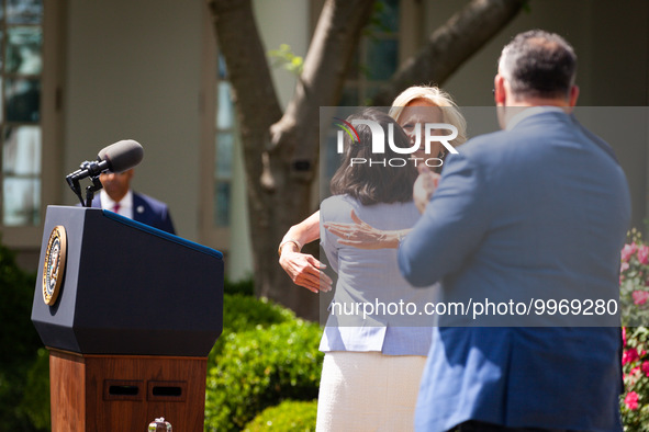 First Lady Dr. Jill Biden embraces Teacher of the Year Rebecka Peterson, a math teacher from Tulsa, OK, at an event honoring Teachers of the...