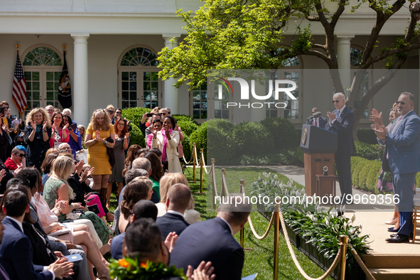 President Joe Biden and attendees applaud the teachers of the year.  President Biden, First Lady Dr. Jill Biden, and Secretary of Education...