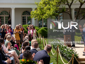 President Joe Biden and attendees applaud the teachers of the year.  President Biden, First Lady Dr. Jill Biden, and Secretary of Education...