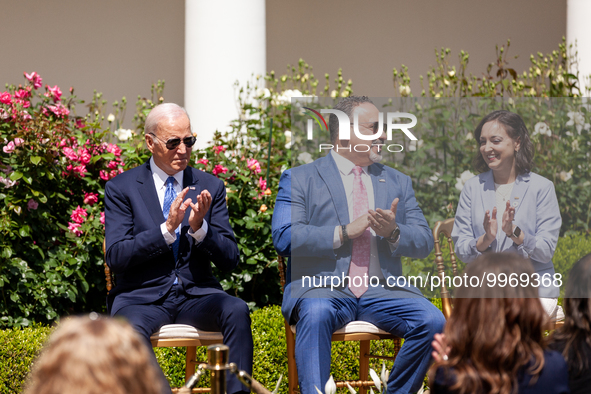 President Joe Biden,Secretary of Education Miguel Cardona, and Teacher of the Year Rebecca Peterson applaud as the First Lady Dr. Jill Biden...