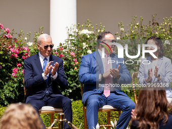 President Joe Biden,Secretary of Education Miguel Cardona, and Teacher of the Year Rebecca Peterson applaud as the First Lady Dr. Jill Biden...