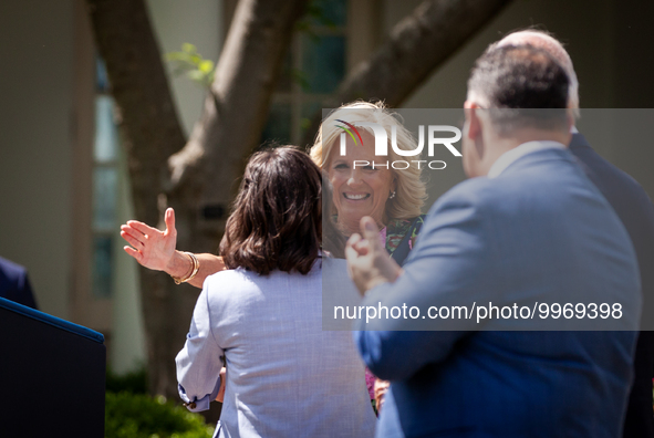 First Lady Dr. Jill Biden embraces Teacher of the Year Rebecka Peterson, a math teacher from Tulsa, OK, at an event honoring Teachers of the...