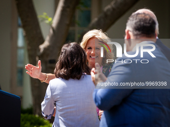 First Lady Dr. Jill Biden embraces Teacher of the Year Rebecka Peterson, a math teacher from Tulsa, OK, at an event honoring Teachers of the...